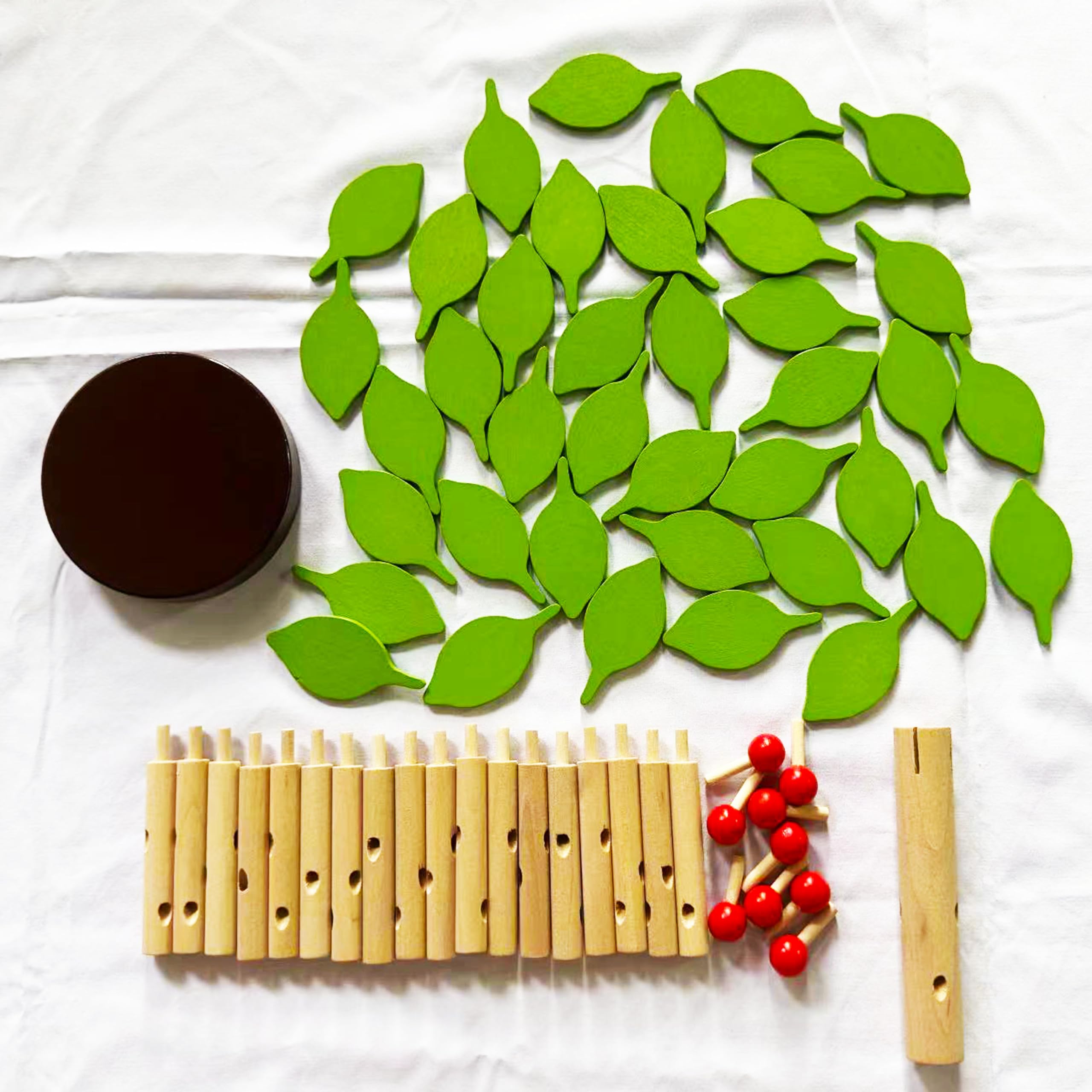 Carykon bright colored wooden tree pieces support tactile learning through hands-on assembly