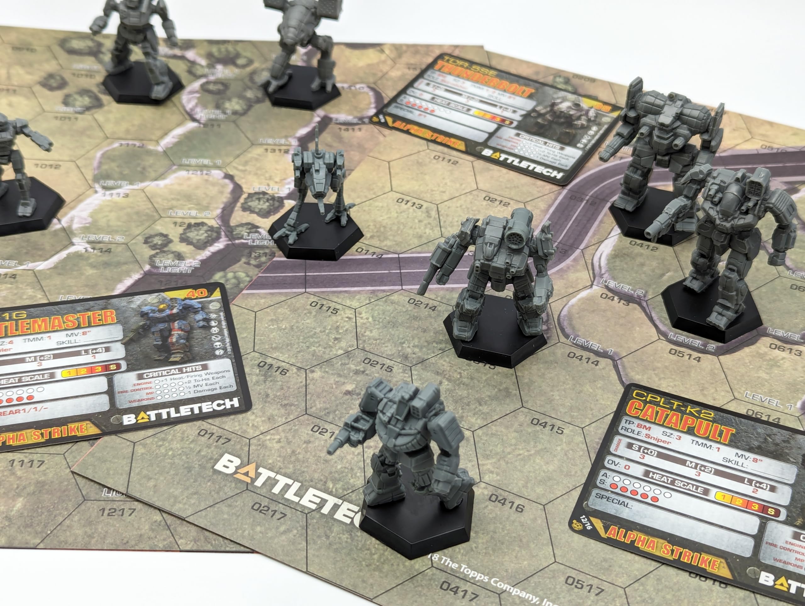 Catalyst Game Labs BattleTech 40th Edition mechs on map image, tactical terrain for immersive skirmishes.