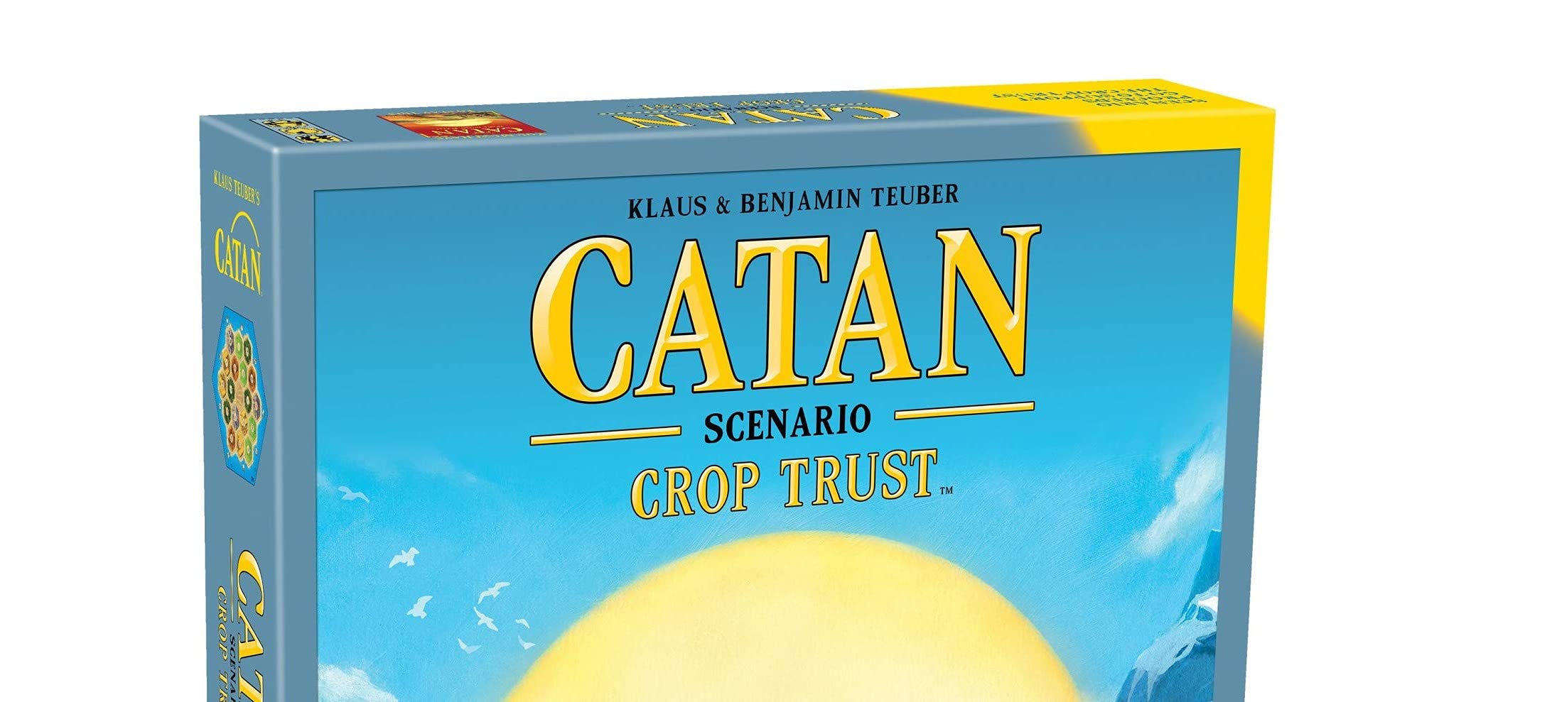 CATAN Crop Trust scene of family play during game night.