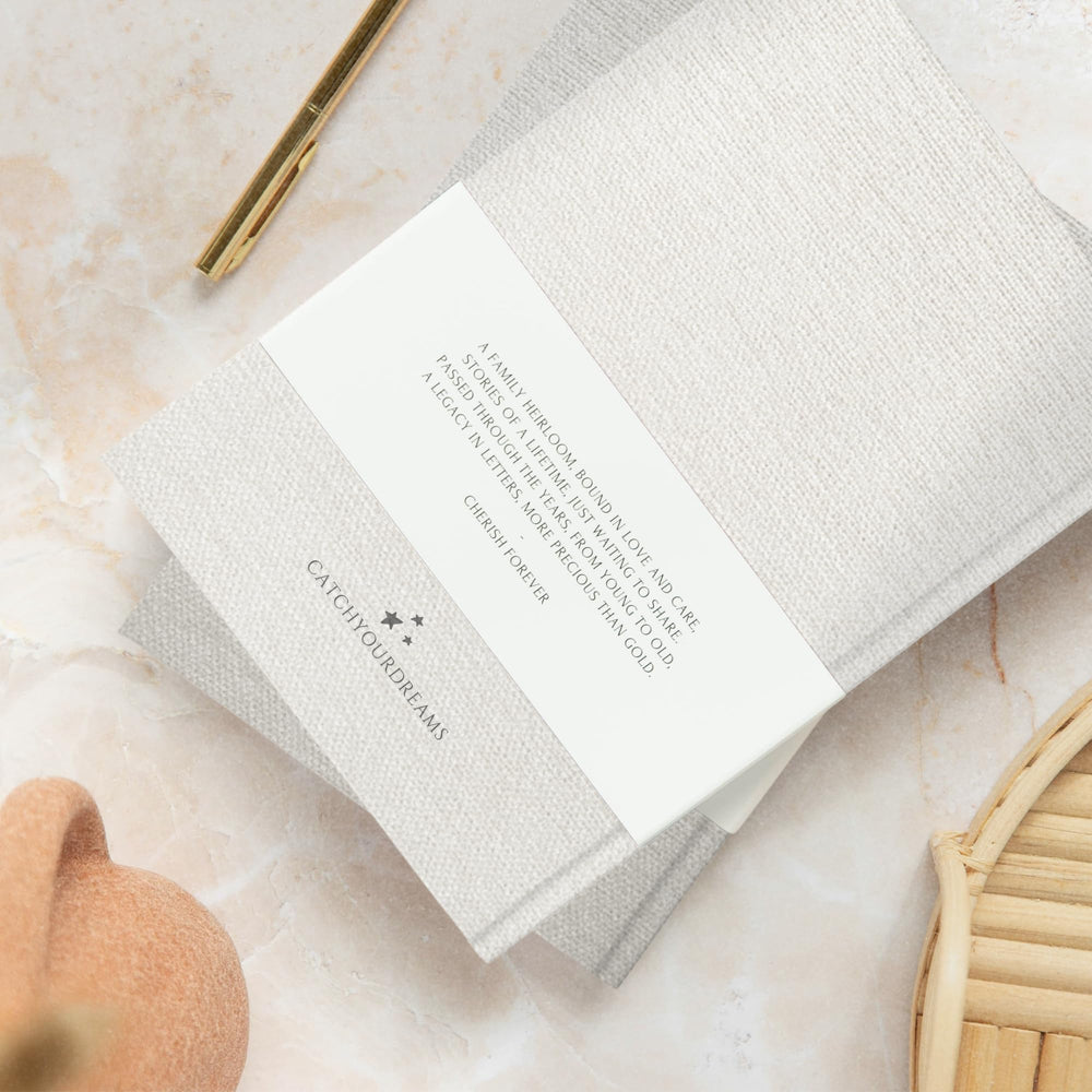 CATCHYOURDREAMS Journal features ribbon bookmark for easy continuation.