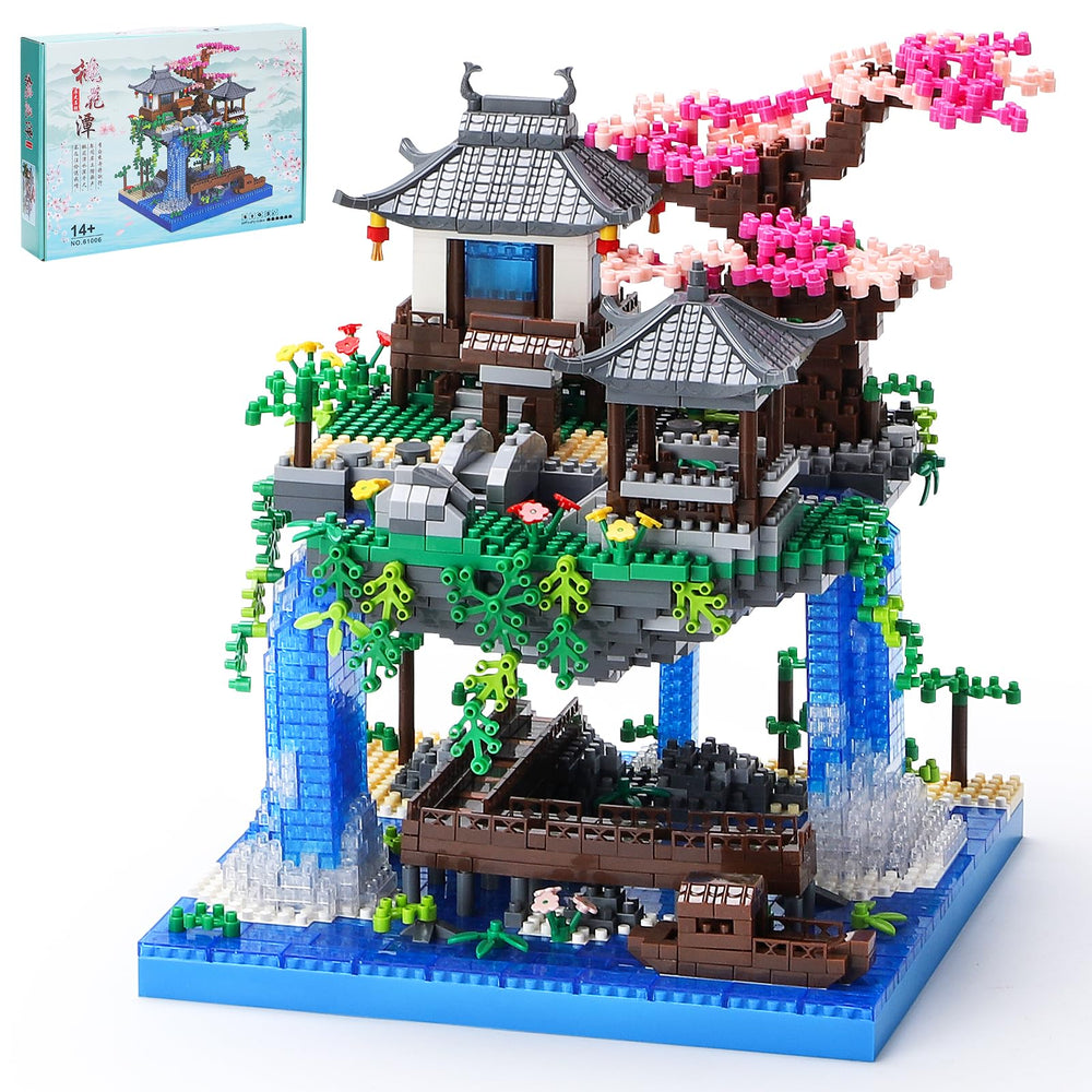CAXIMSY Cherry Blossom Bonsai Tree House assembly with vibrant bricks and intricate details.
