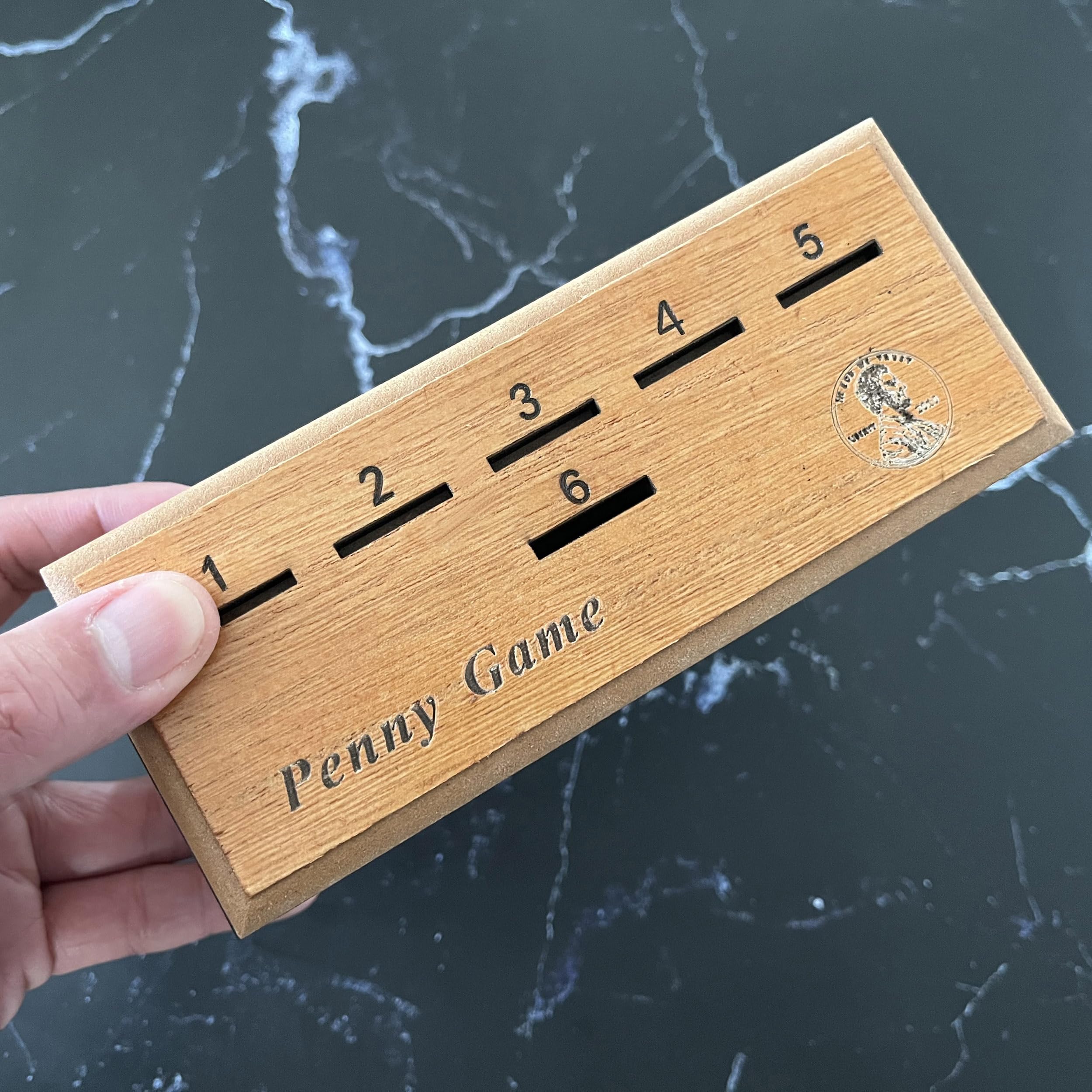 CBLKUS Penny Game dice roll, suspense builds as players plan moves.