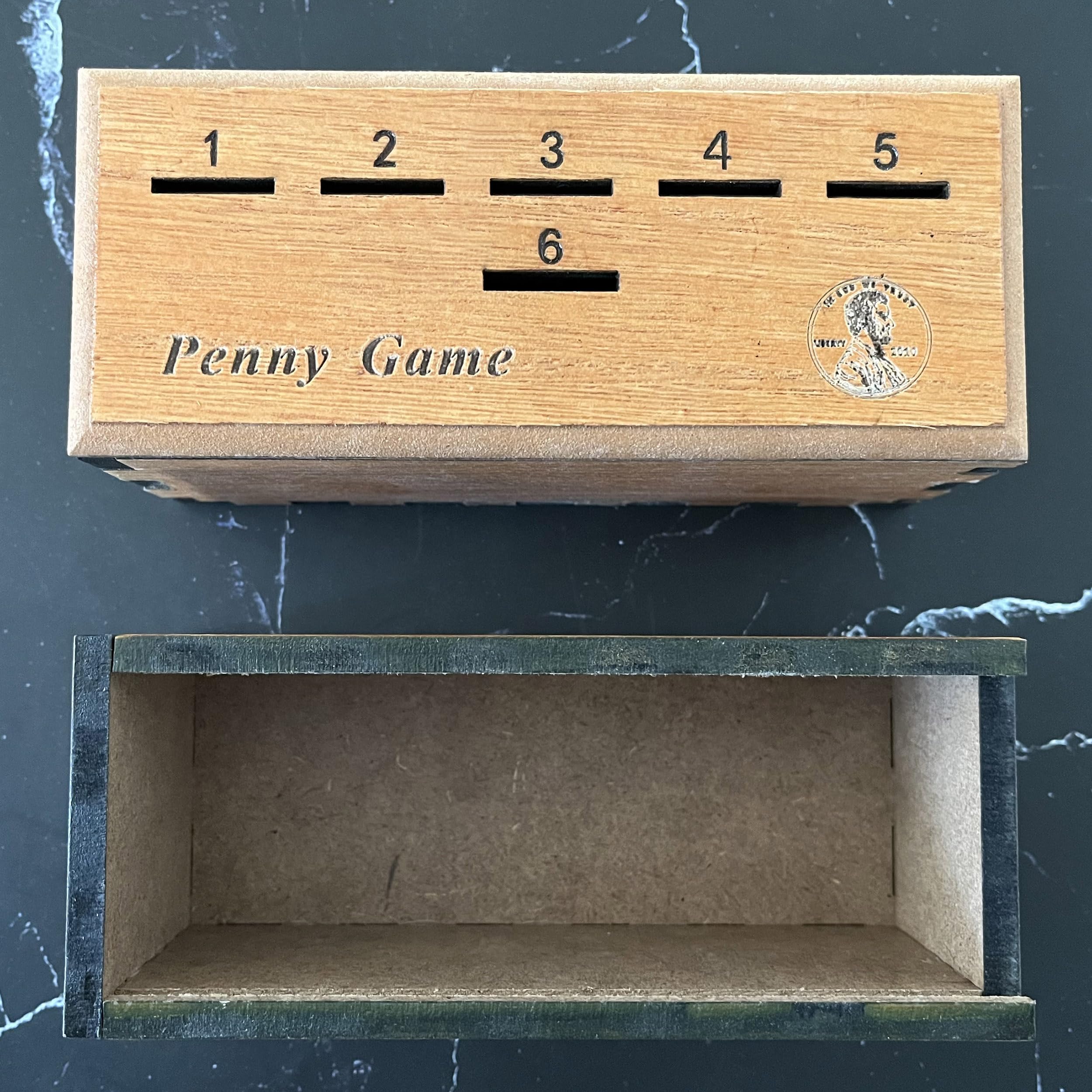 CBLKUS Penny Game inside view highlights compact portability.