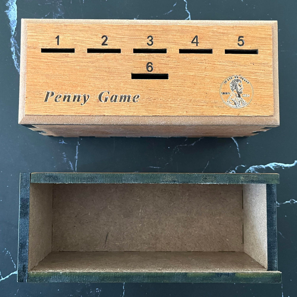 CBLKUS Penny Game inside view highlights compact portability.