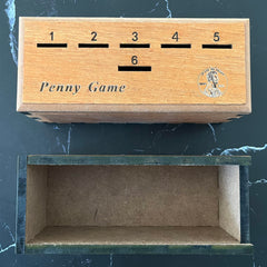 CBLKUS Penny Game inside view highlights compact portability.