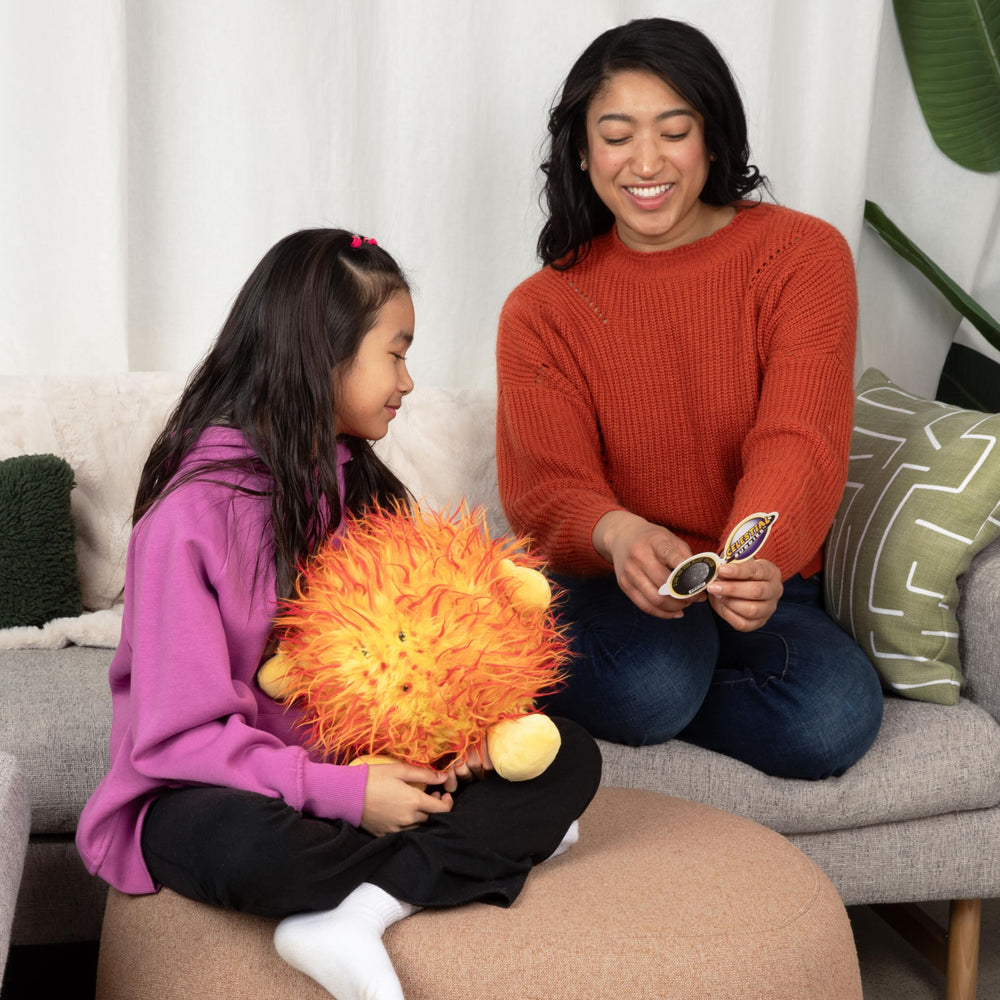 Celestial Buddies Sun Buddy showcases embroidered features for tactile learning.