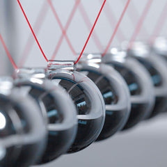 CERROPI Newton cradle aligned seven balls showing precise timing