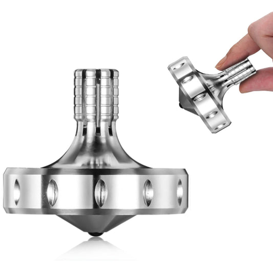 CHEETOP precision metal spinning top demonstrates a smooth spin on a desk for focus and stress relief.