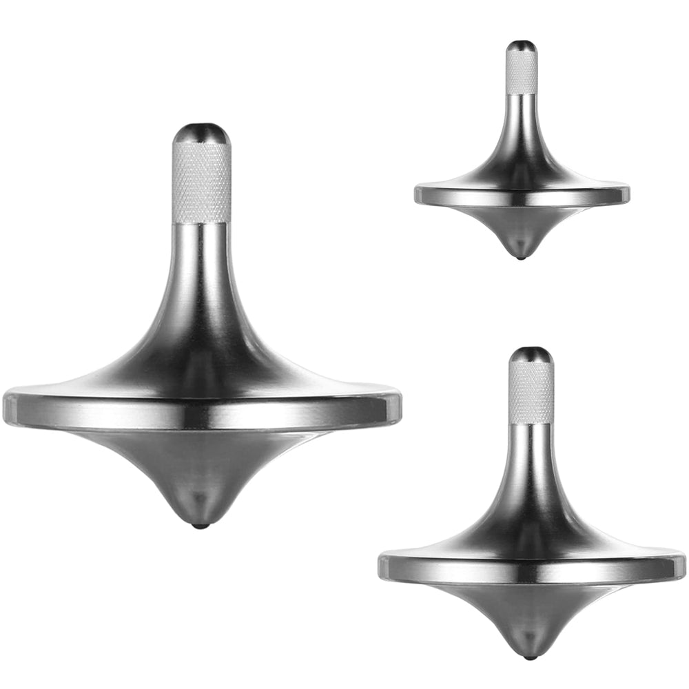 CHEETOP stainless steel spinning top on a large base showing long spin potential