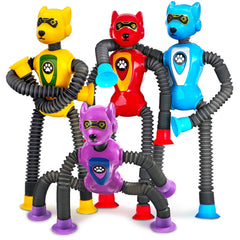 CHESLICR Robot Dog Pop Tubes on a desk for sensory play and travel focus.