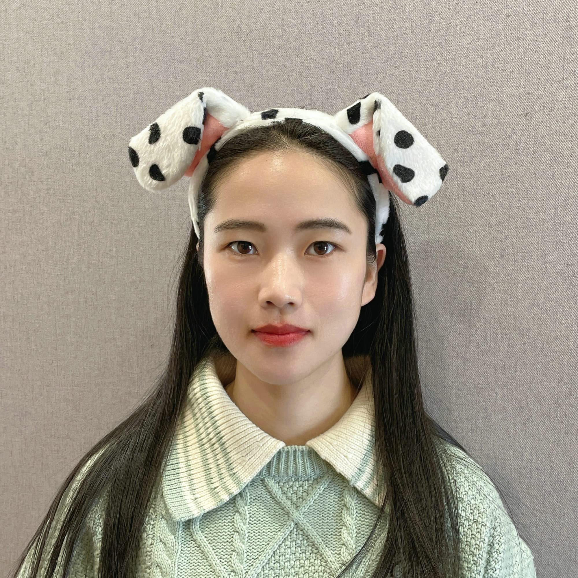 CHEU dalmatian ears headband worn by a child at a party