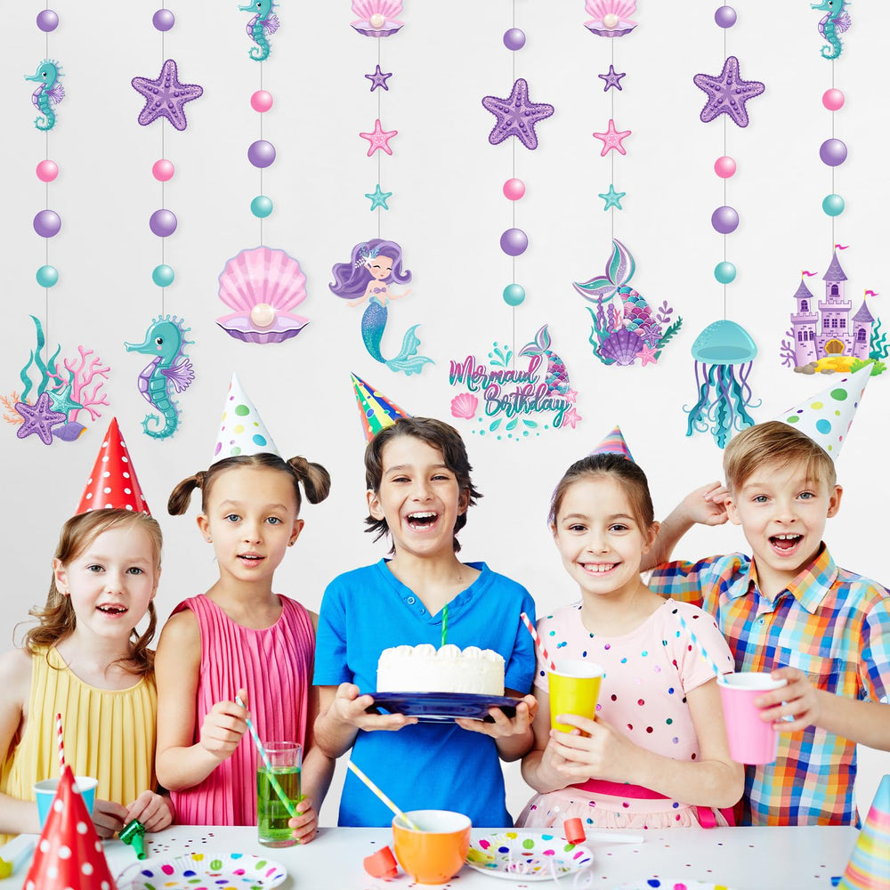 Cindeer pink green purple mermaid decor brings vibrant party atmosphere.