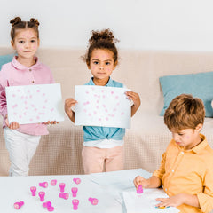 Classroom prizes decorated with Cinrobiye pink bow stampers.