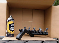 Citadel Chaos Black coverage on a miniature provides a smooth base layer.