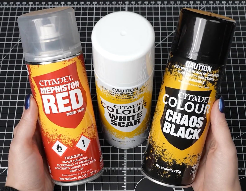 Citadel Chaos Black spray angle demonstrating consistent mist for uniform priming.