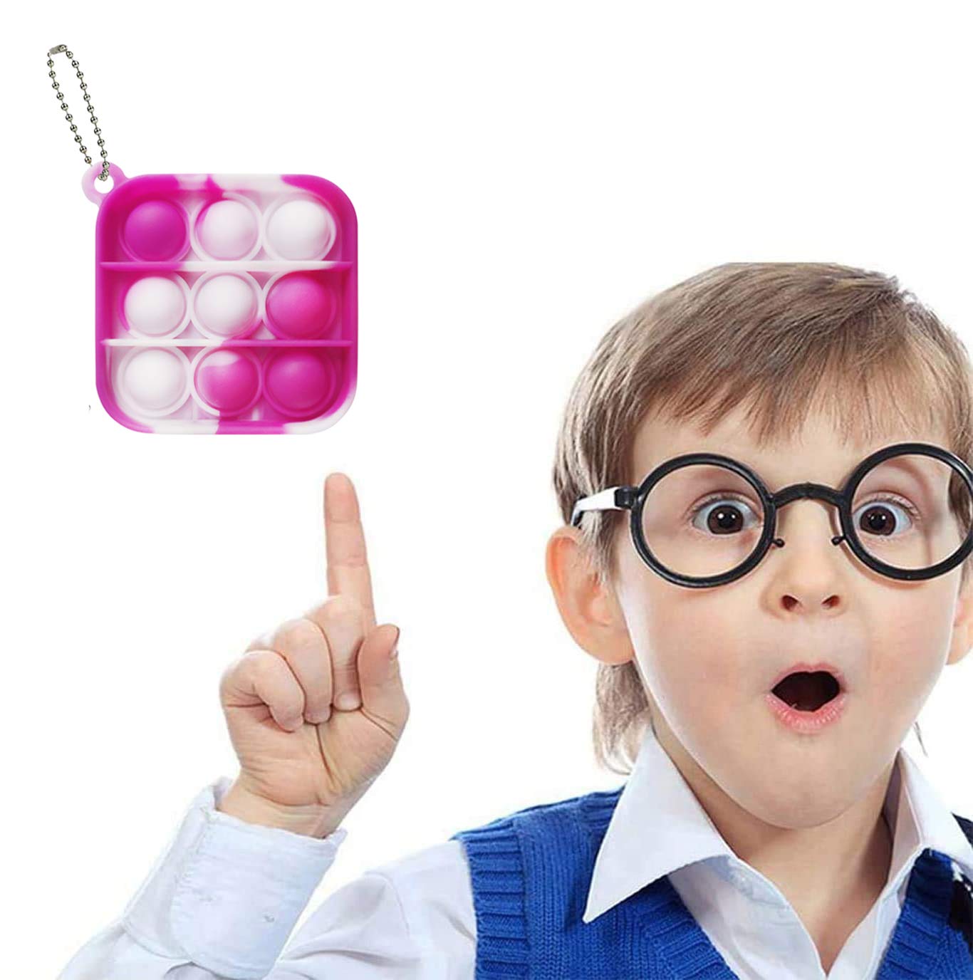 Clanam mini pop bubble toy on a desk demonstrating quick stress relief play