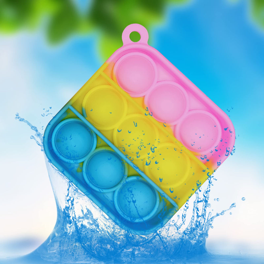 Clanam pop bubble keychain attachment ready to attach to bags.