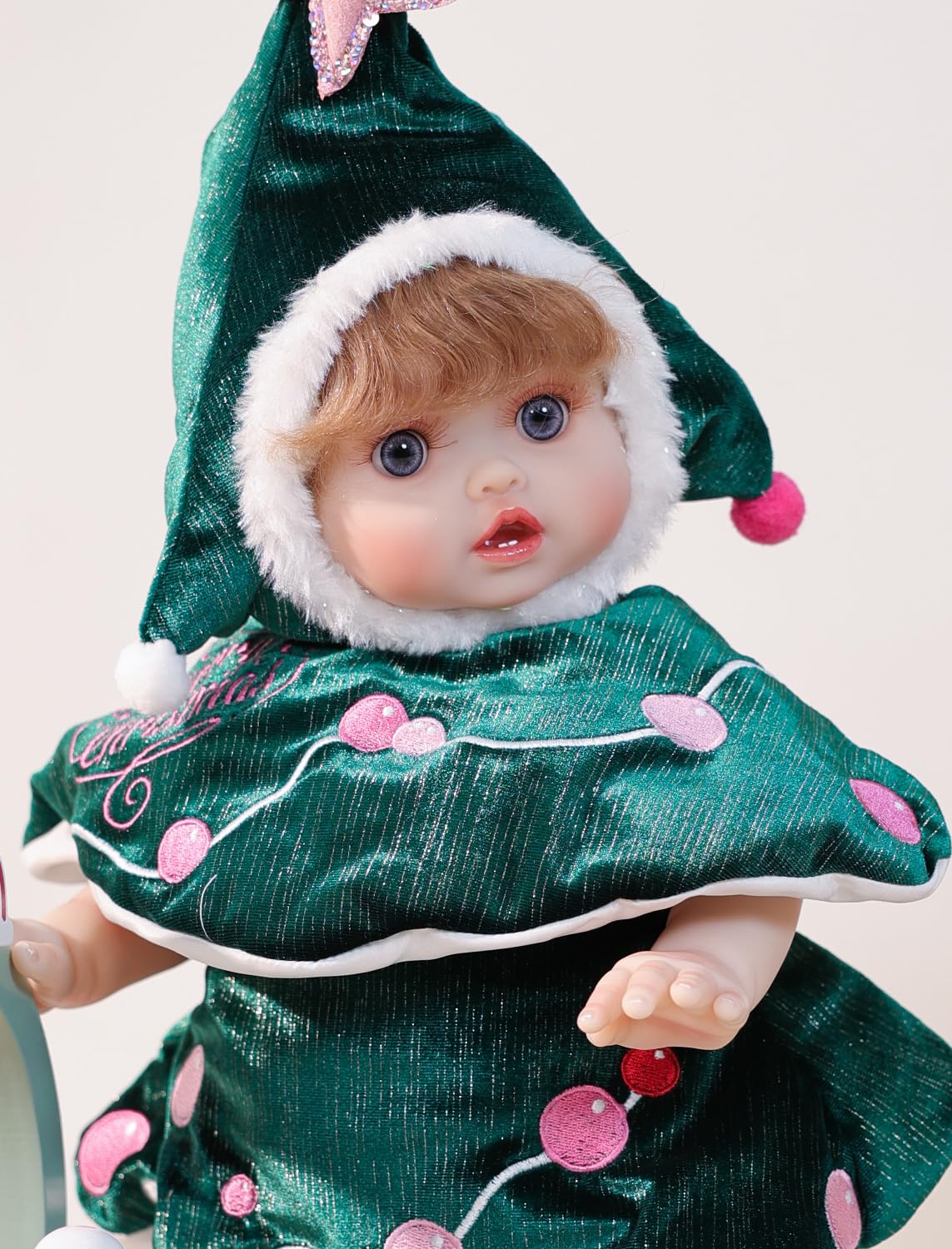 Cloveray 18-inch reborn doll with curly hair for imaginative play.