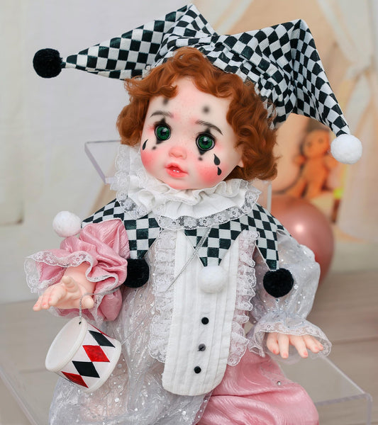 Cloveray Harlequin doll with curly hair shown up close