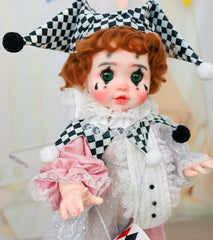 Cloveray Harlequin doll showcasing mini drum accessory