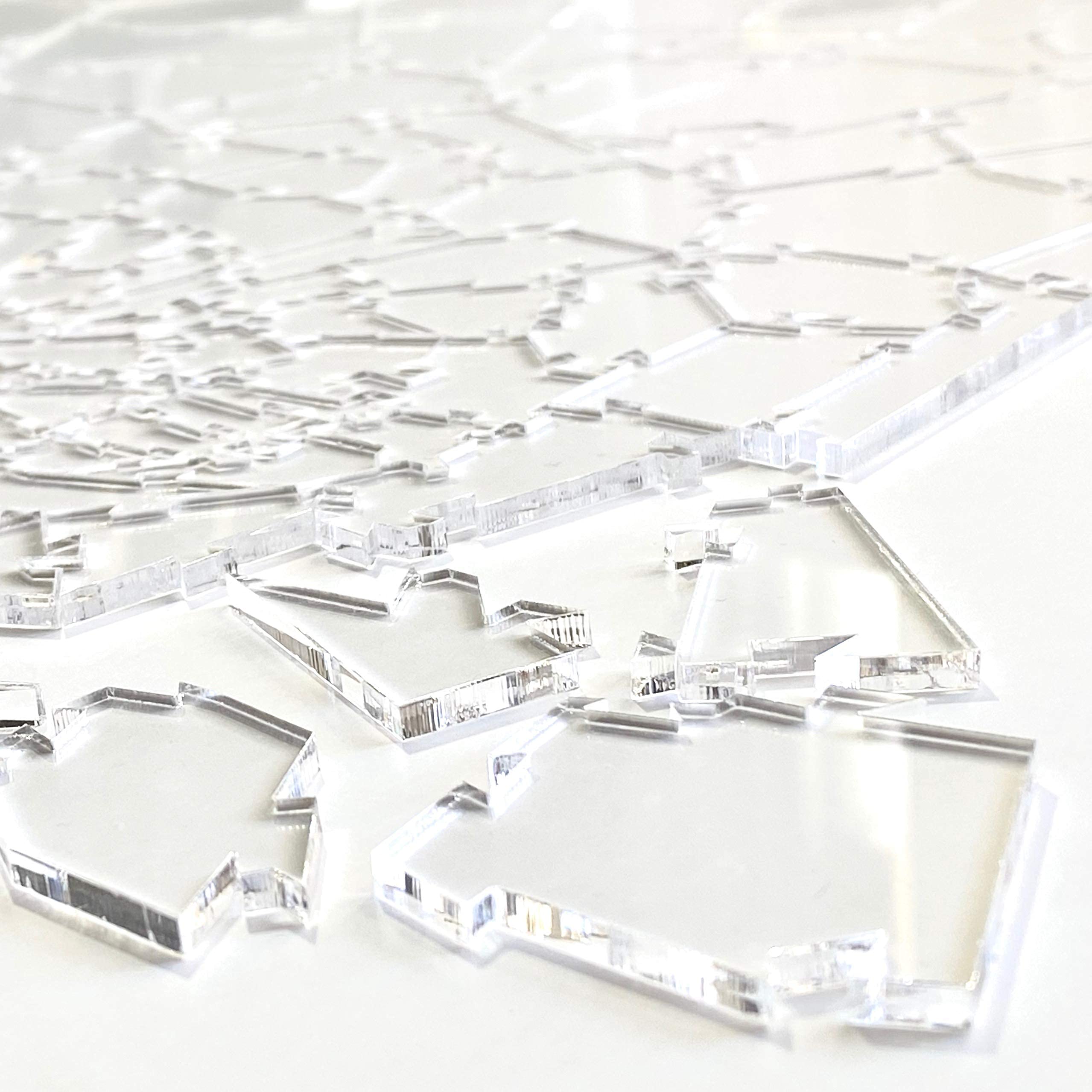 Edge-detail of CM Originals Broken Glass Puzzle emphasizing unique shapes.