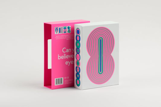 CMYK Figment Magenta Edition deluxe packaging highlights premium design and collectible components.