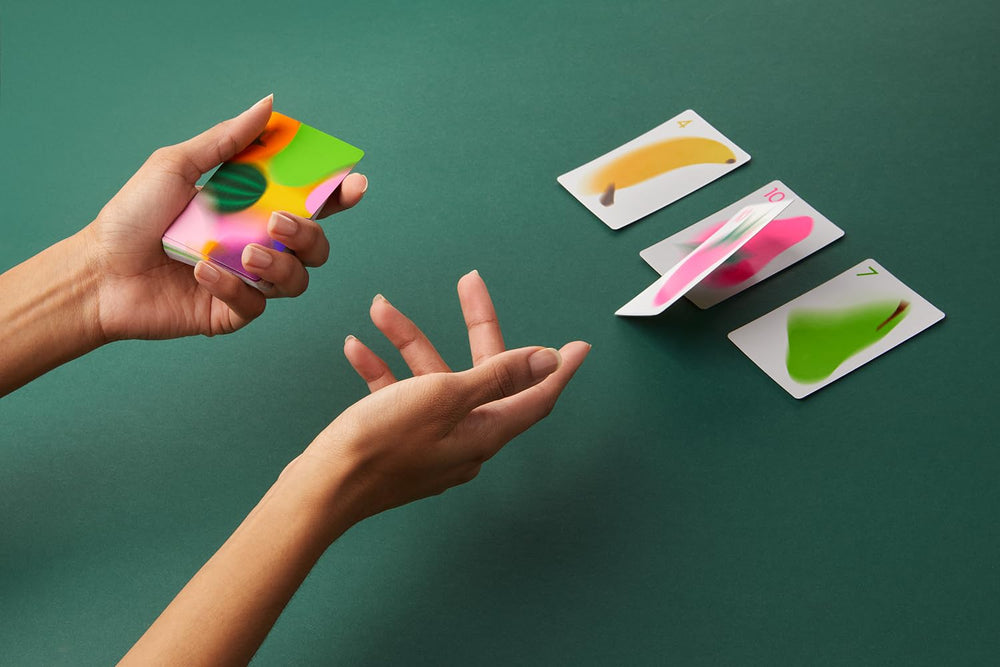 CMYK Fruit Fight Magenta Edition close-up shows vibrant illustrations for immersion.
