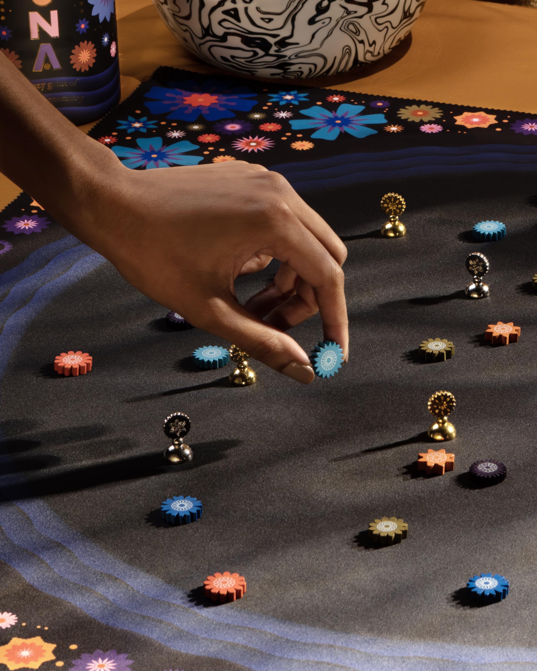 CMYK Lacuna board game play scene with two players and calm focus.