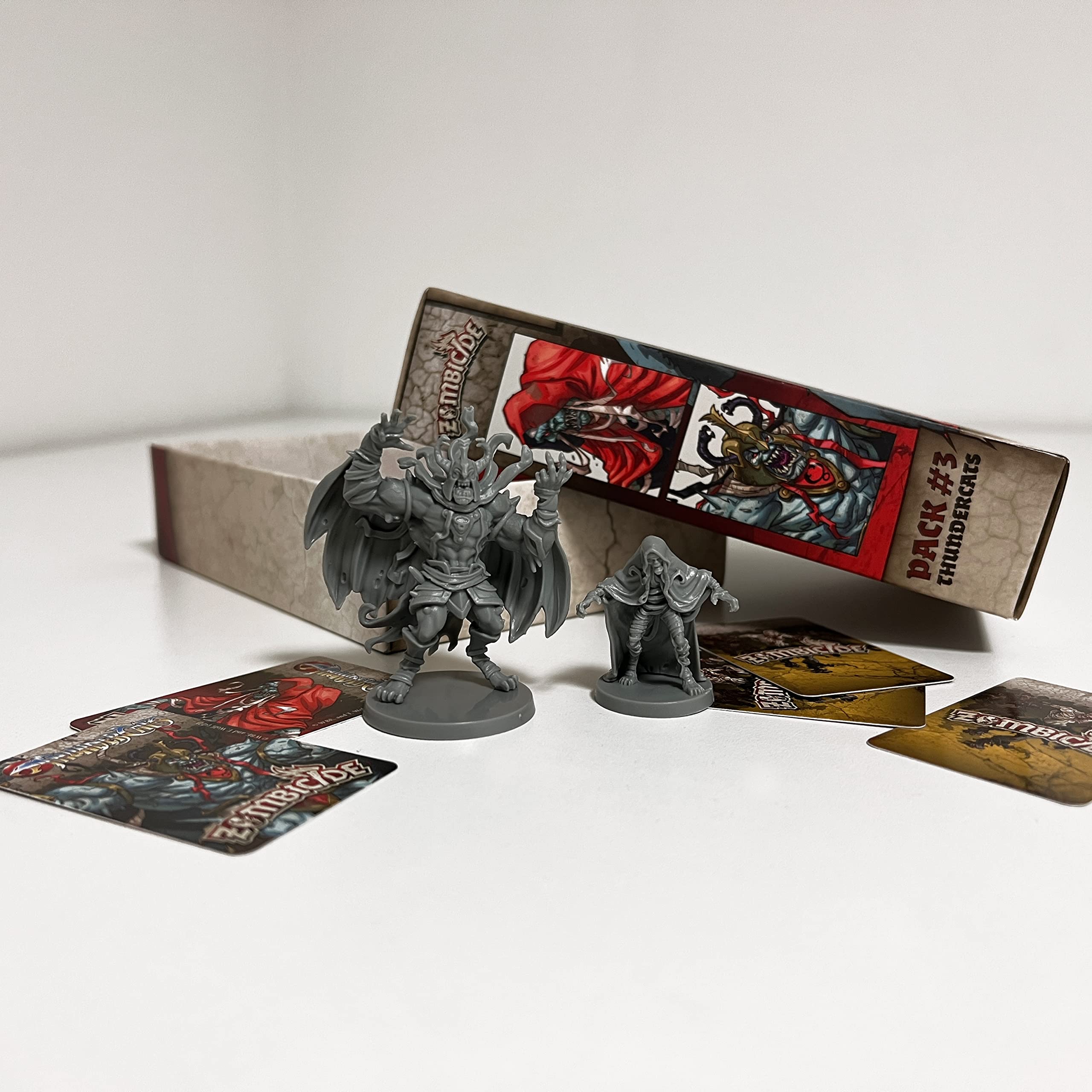 CMON Zombicide Thundercats Mumm-Ra Abomination on the battlefield, dramatic clash for survival.