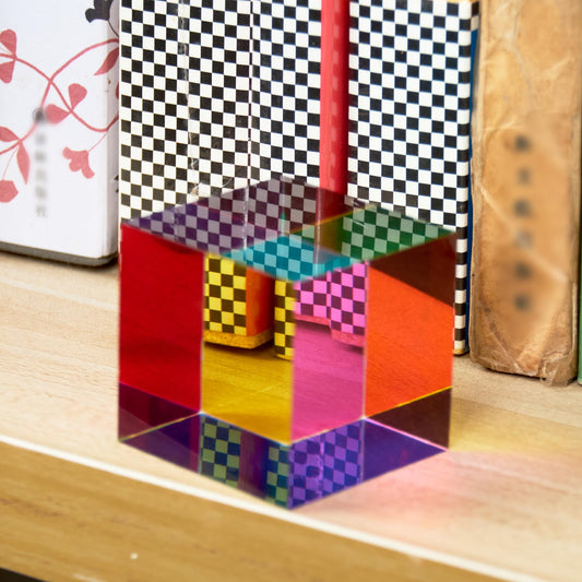 CMYCUBE CMY color cube surface angles reveal shifting hues for color exploration.