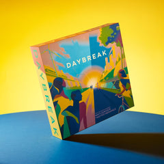 CMYK Daybreak board game parts feature premium, eco-friendly components.