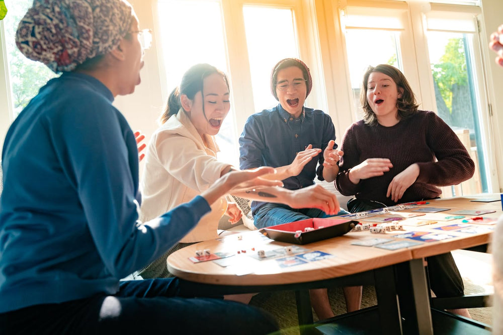 CMYK Spots Dice Game: portable box ideal for game nights and travel.