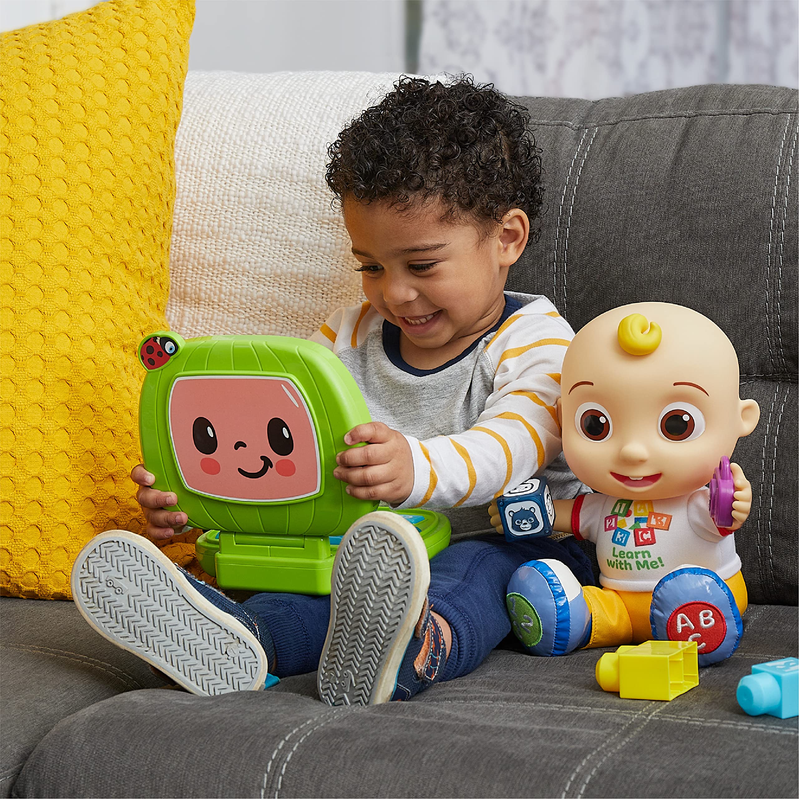 Bright light-up buttons invite exploration and music playback for curious kids.