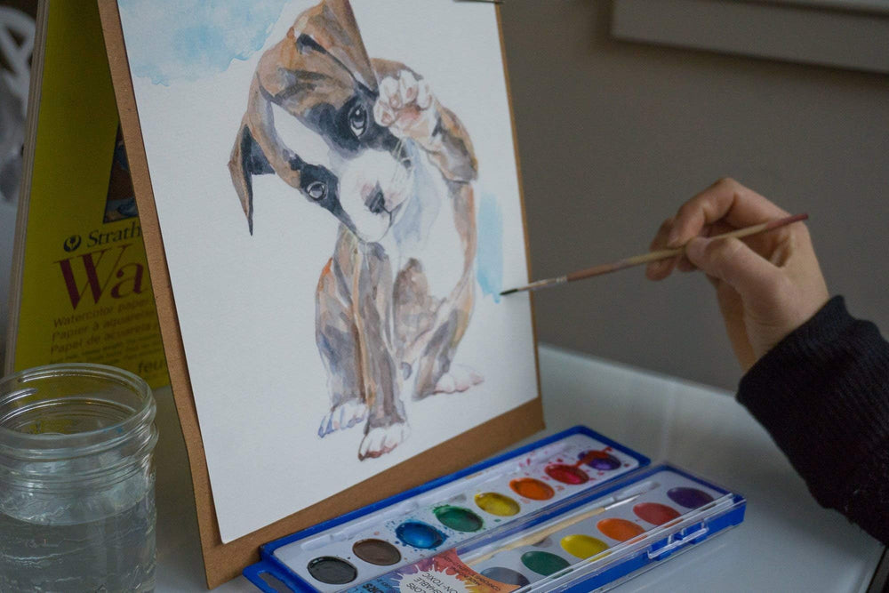 Color Swell watercolor sets with wooden brushes displayed for blending colors