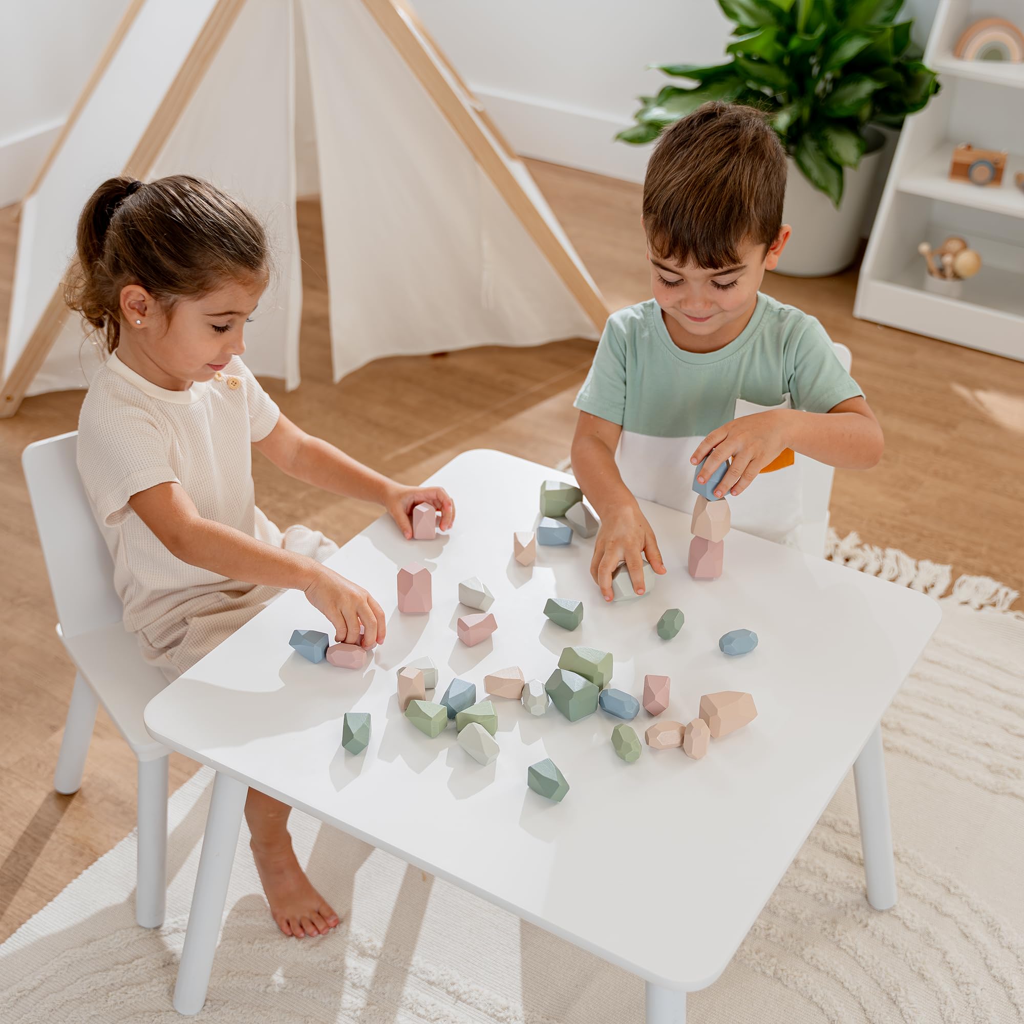 Comfy Cubs Stacking Rocks colors closeup: vibrant hues boost sensory exploration.