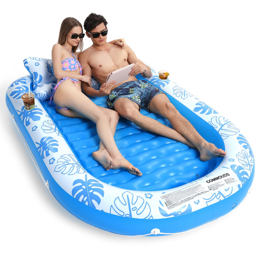 COMMOUDS SkyBlue XL pool lounger on water for sunbathing and relaxation.