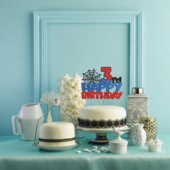Confetti! superhero topper sized for cakes as a prominent yet not overpowering centerpiece