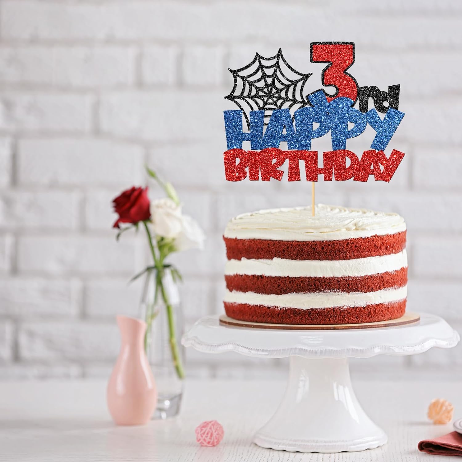 Confetti! superhero topper uses a bamboo stick for food-safe cake support
