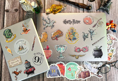 ConQuest Journals Hedwig sticker brightens Kindles with delicate watercolor.