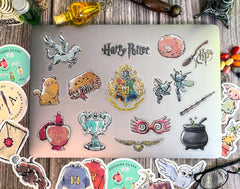 ConQuest Journals House mascots sticker adds team color to notebooks.