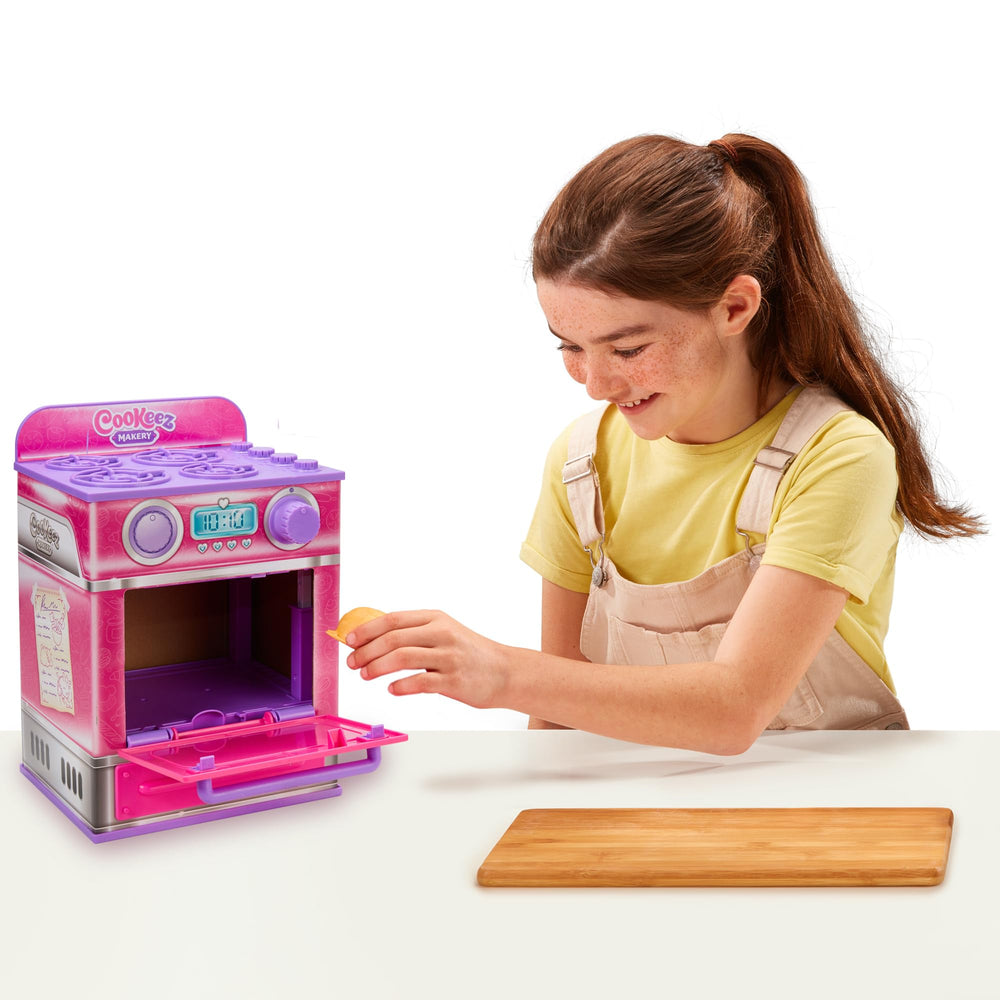 Cookeez Makery oven ding signals a playful bake reveal for kids.
