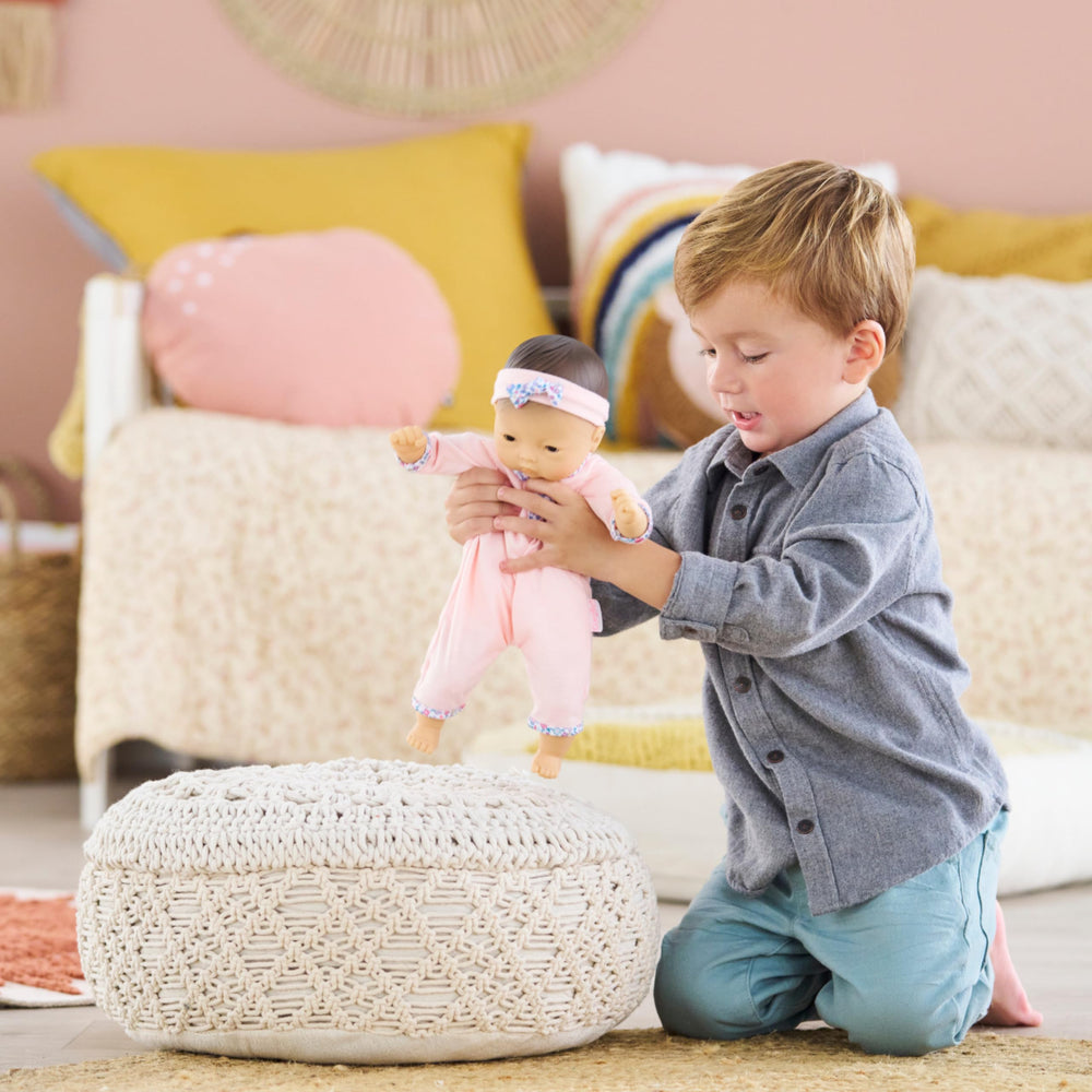 Corolle Mila soft body design supports easy grasp by little hands.
