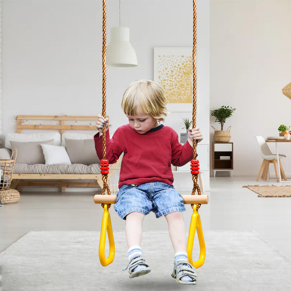 Backyard or gym use with Covzoe trapeze bar for family fun.
