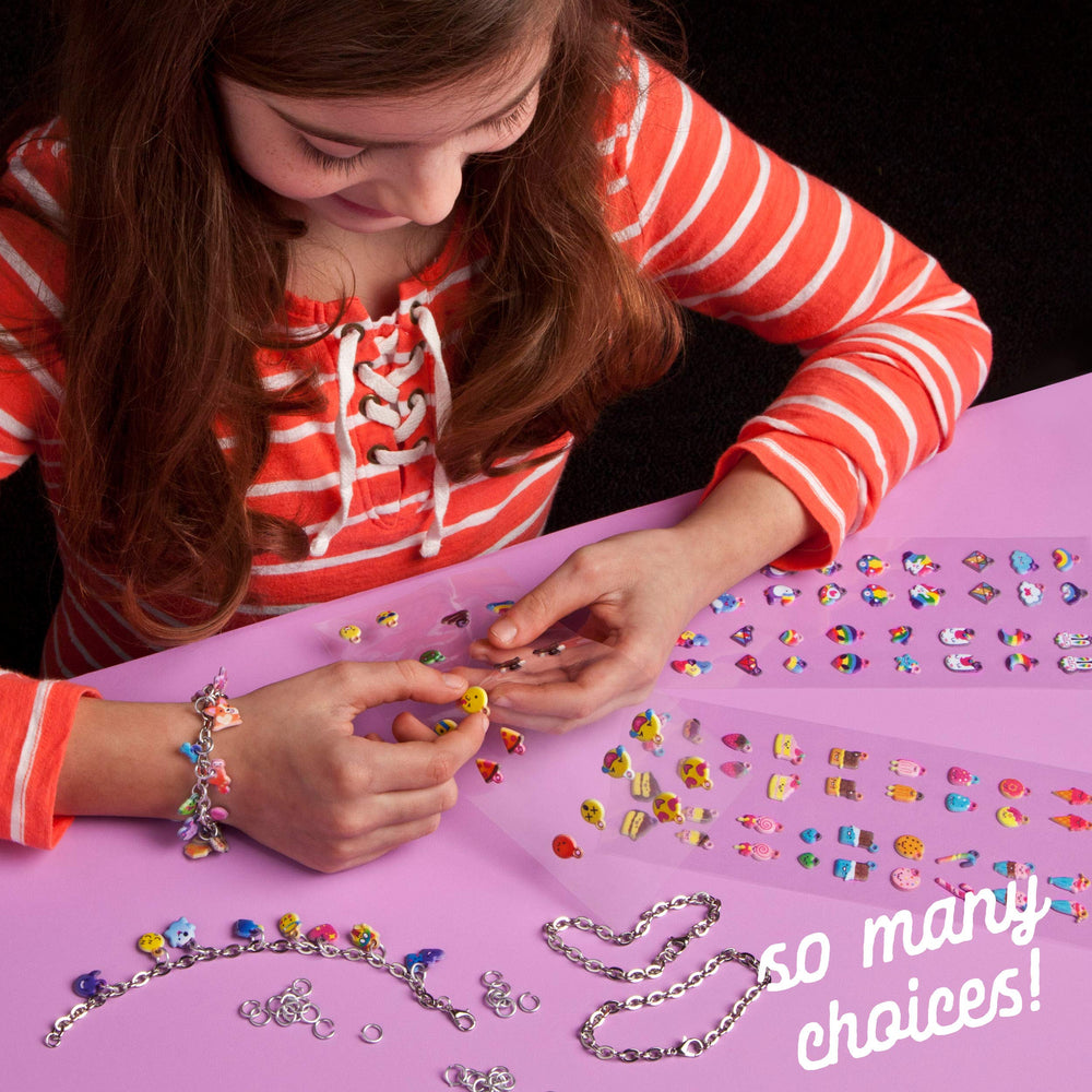 Craft-tastic kit contents show four bracelets, stickers, rings, and directions