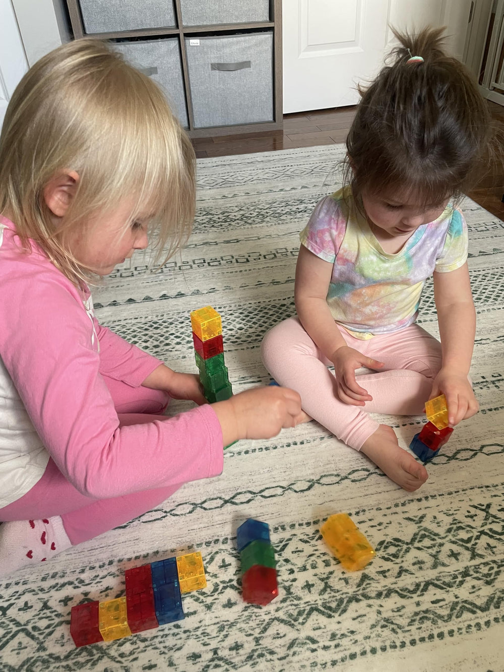 Crayola Bold PIP Cubes encourage exploration of shapes and spatial reasoning.