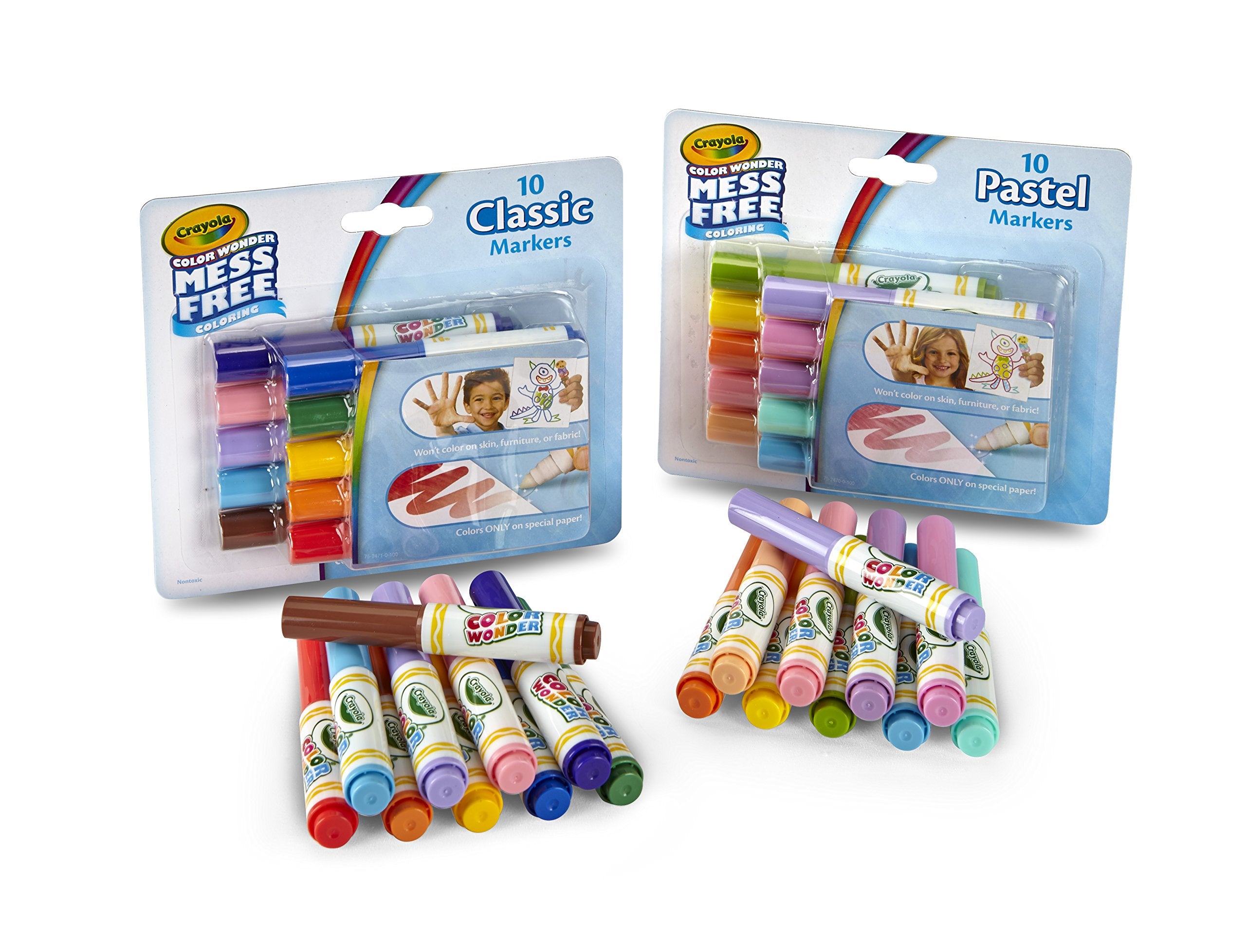 Child drawing with Color Wonder markers on Color Wonder paper for clean creativity