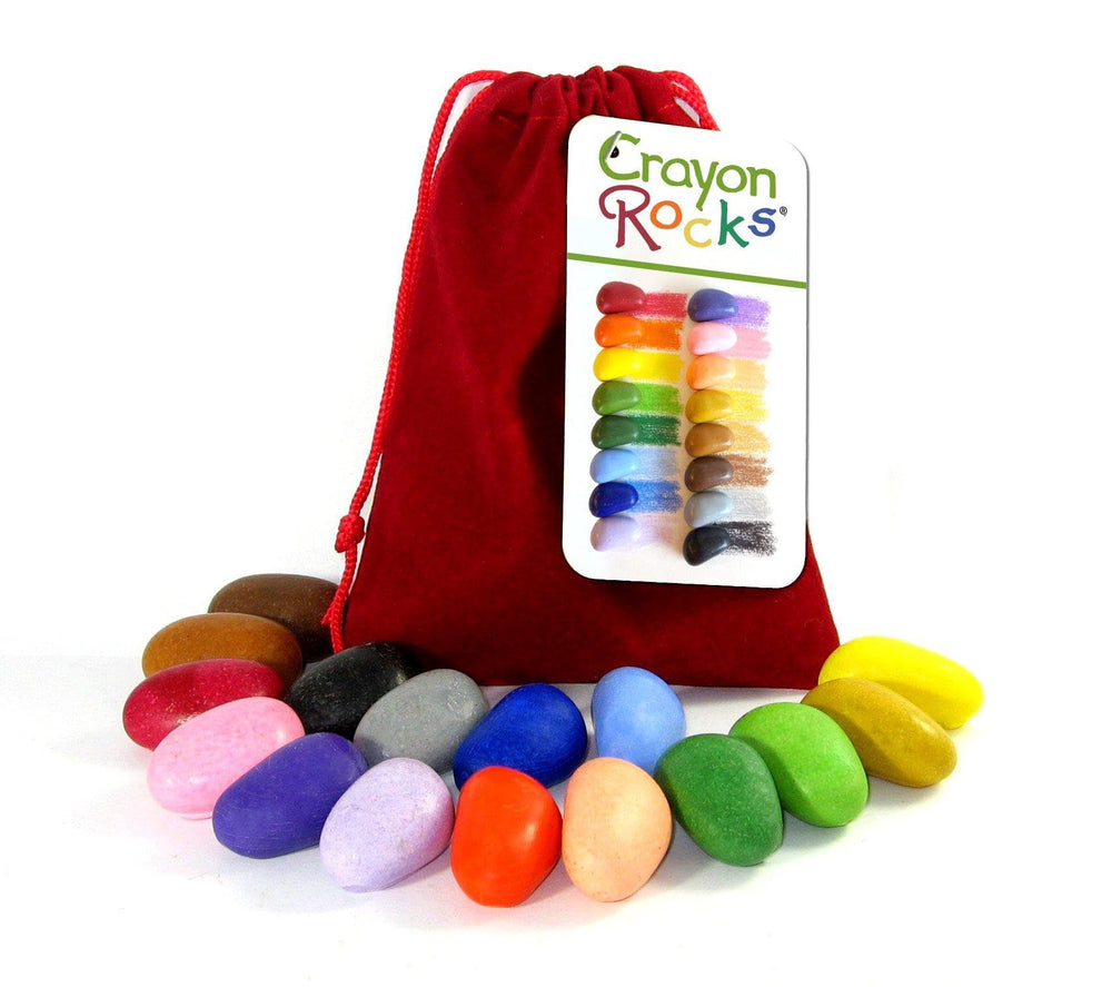 Crayon Rocks child coloring with a relaxed grip, in use.