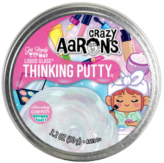 Crazy Aaron's Get Ready with Me Thinking Putty clear base with pink teal sparkles for shimmering play