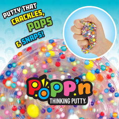 Crazy Aaron's Poke N Dots putty stretched for sculpting and sensory play.
