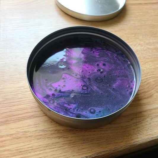 Close-up of color-shifting metallic blue, purple, copper, and red in Crazy Aaron's Super Scarab